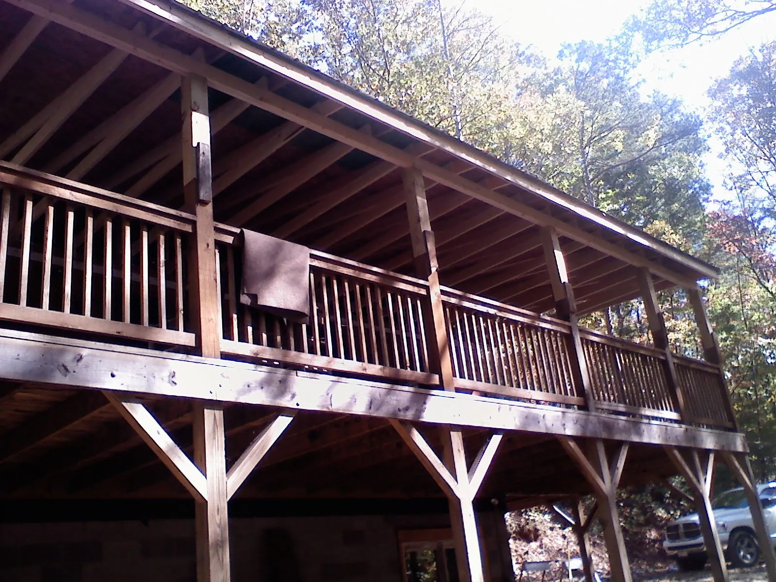 Timber framing under a new elevated porch and deck — Roof Leak Repair in Carrollton by Roofing Brothers